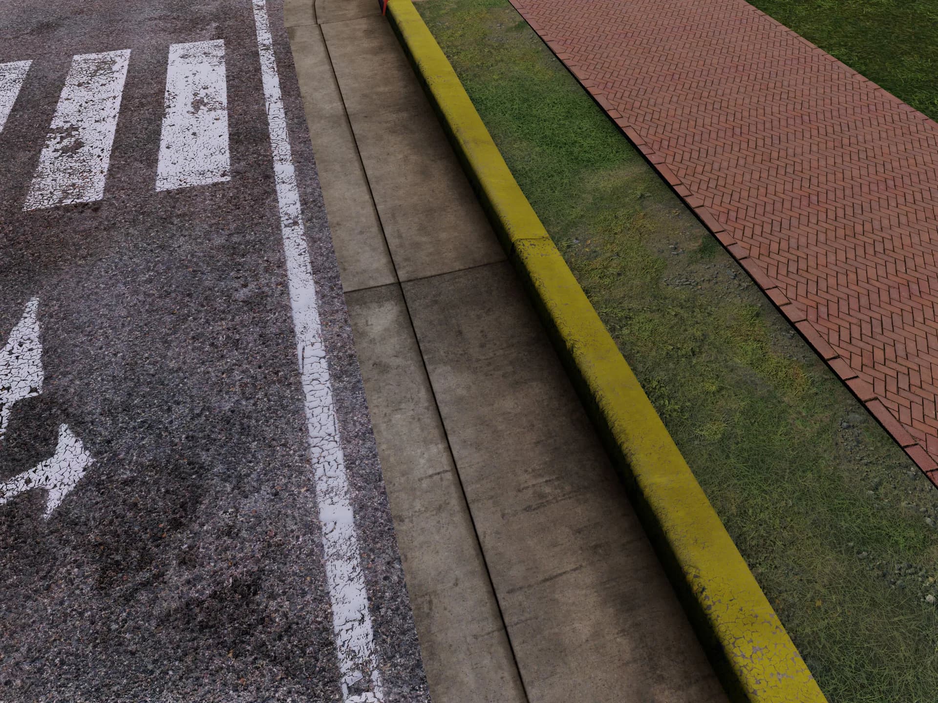 Close-up of curb, sidewalk, and brick paving material transitions